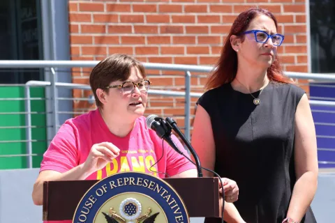 Below: Friedman outside the APLA’s Gottlieb Medical Center with APLA CEO and LA LGBT Center.