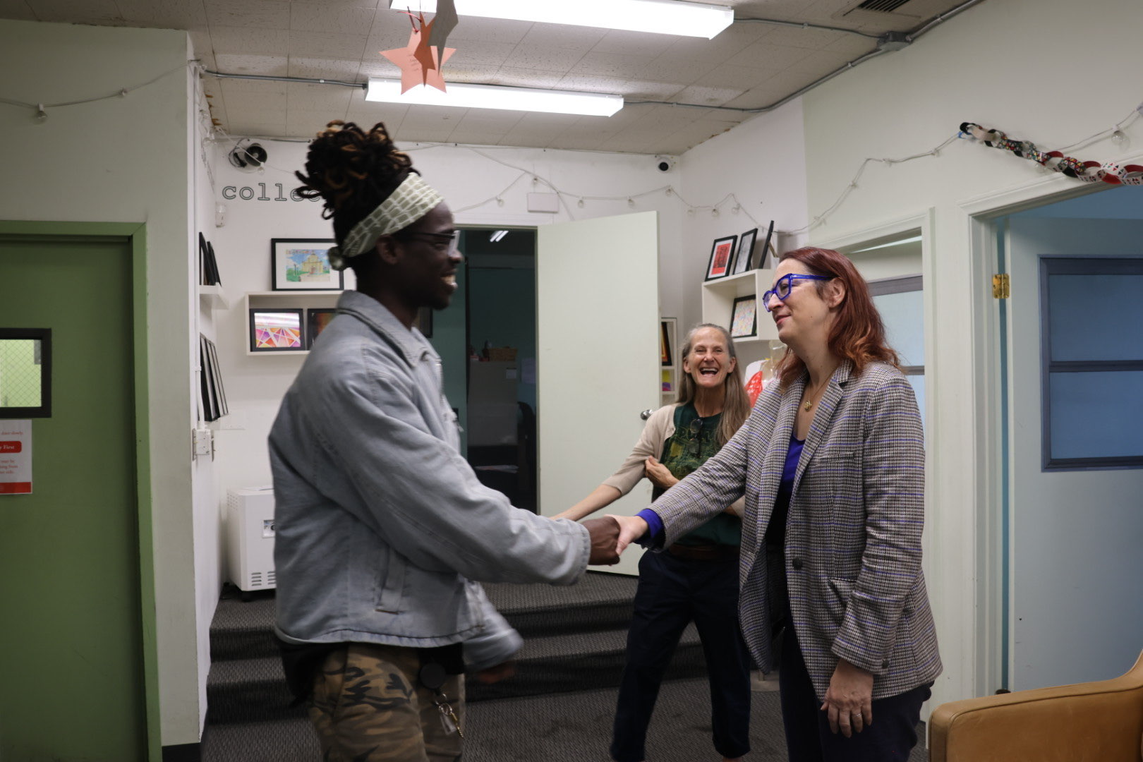 LSF shaking hands with MFP Staff