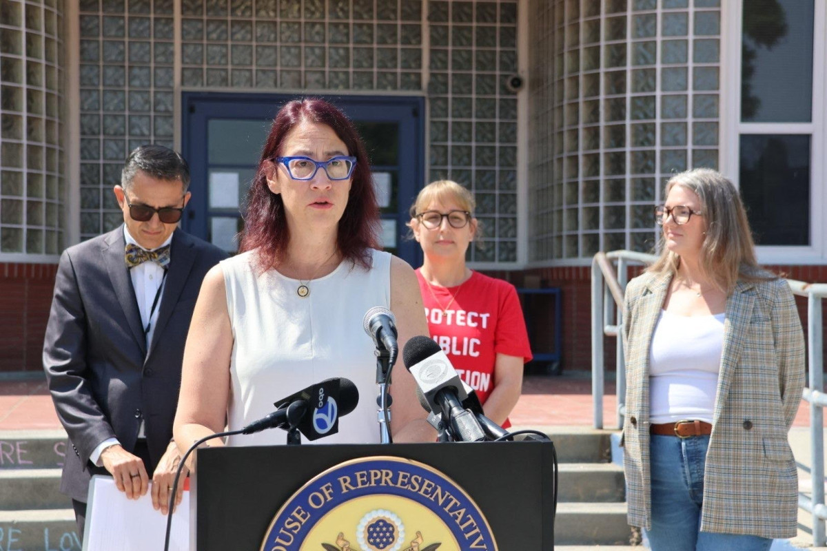 Above: Friedman in front of school administrators, educators, and parents.