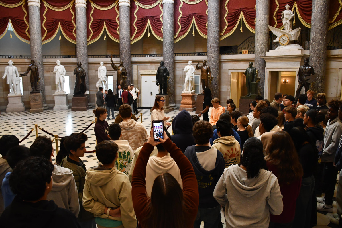 Below: Rep. Friedman speaks to students in National Statuary Hall.