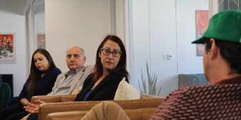 Friedman speaking with Hollywood business leaders and stakeholders. 