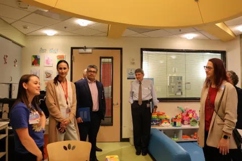 Below: Friedman speaks with Child’s Life Specialists.