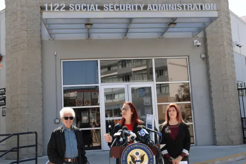 Below: Friedman speaks on the impacts that office closures and cuts will have on seniors and veterans.
