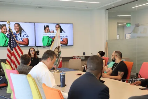 Friedman hosting an LGBTQ roundtable with local organizations and advocates.